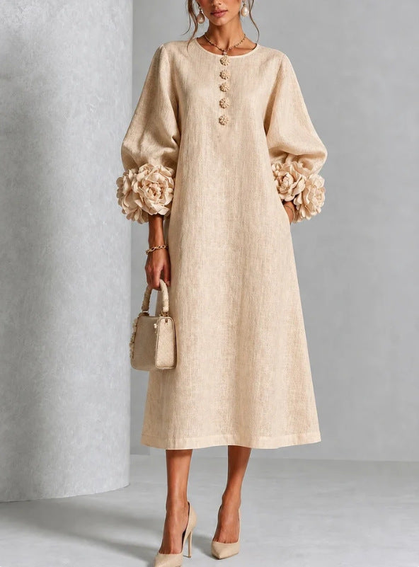 View of the practical side pockets on the Elowen midi button dress, perfect for everyday convenience.
