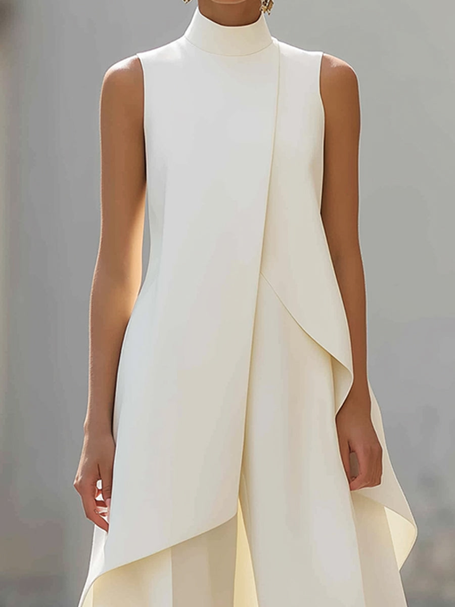 Overhead shot of the black jumpsuit laid flat, displaying its full design and clean lines.