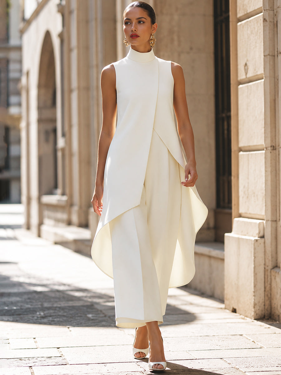 Close-up of the waist and pant leg detail of a sage green elegant jumpsuit.