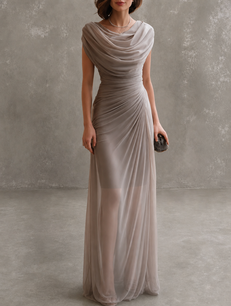 Full-length view of a woman wearing the flowing navy blue maxi dress, showcasing its comfortable and elegant drape.